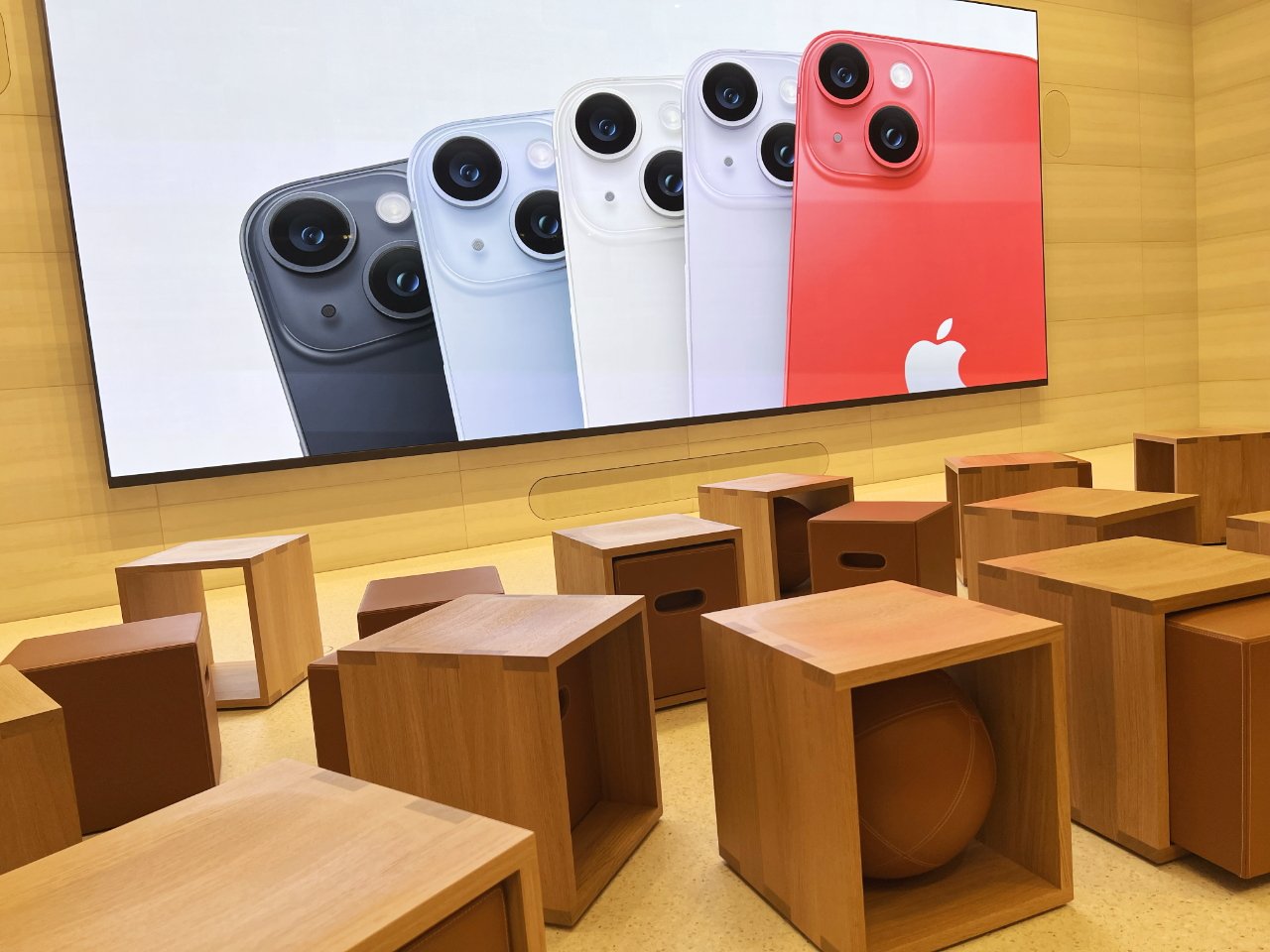 Forty wooden cubes with extra spaces in most of them in the Today at Apple section.