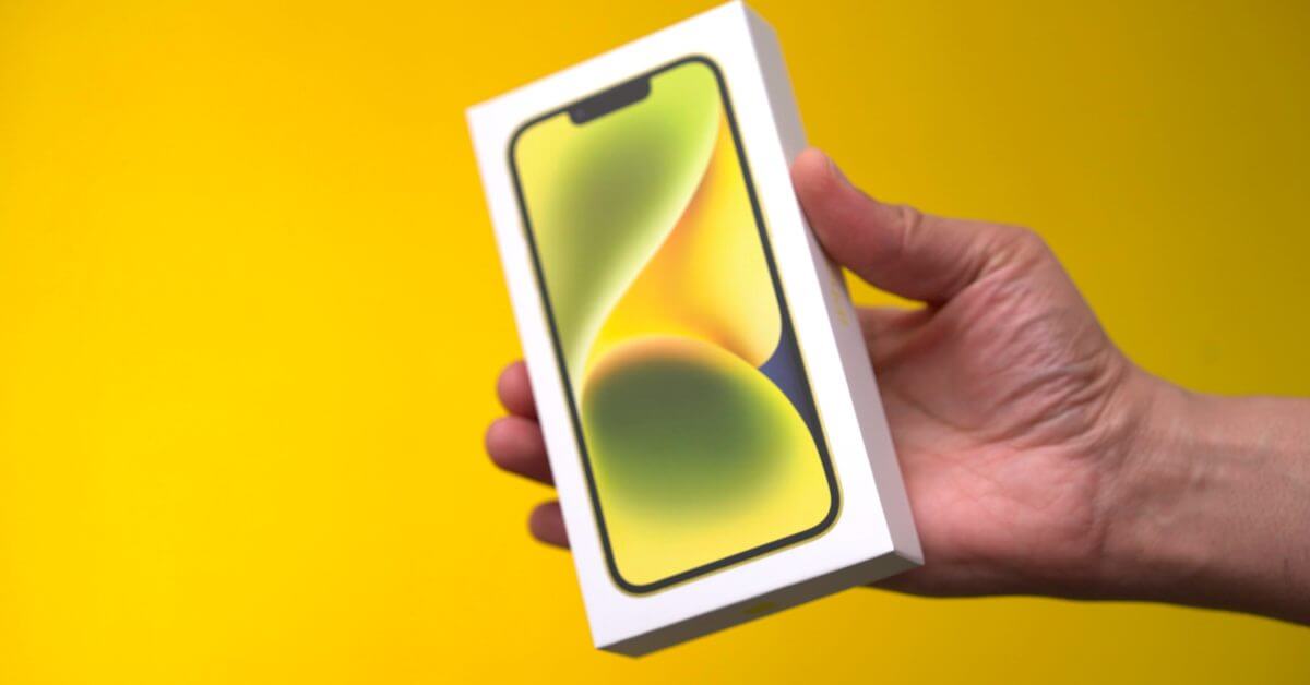 Загрузите новые желтые обои для iPhone 14 прямо здесь.