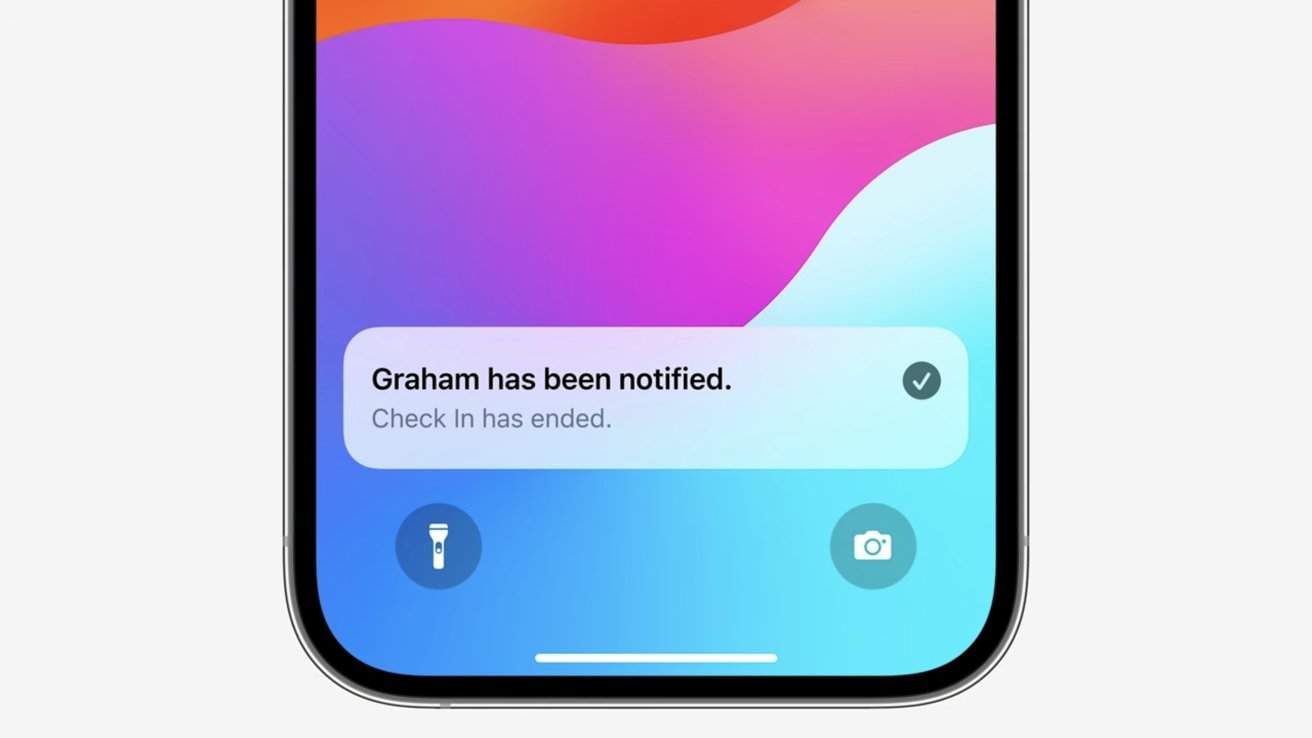 На экране смартфона отображается уведомление: «Грэм получил уведомление.  Регистрация завершена.» с красочным фоном.