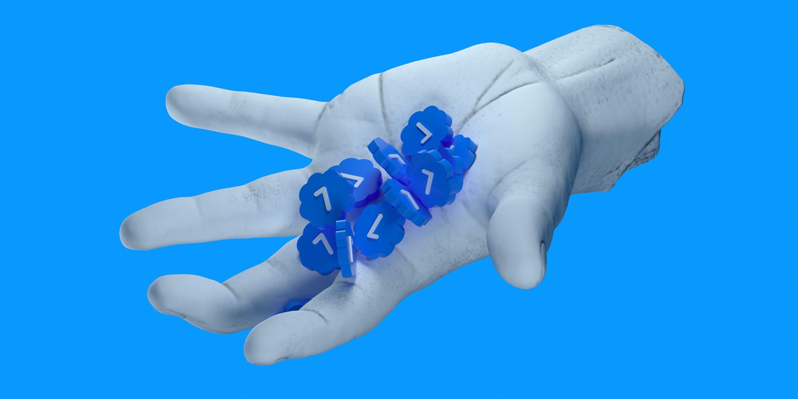 X синих галочек в искусственной белой руке
